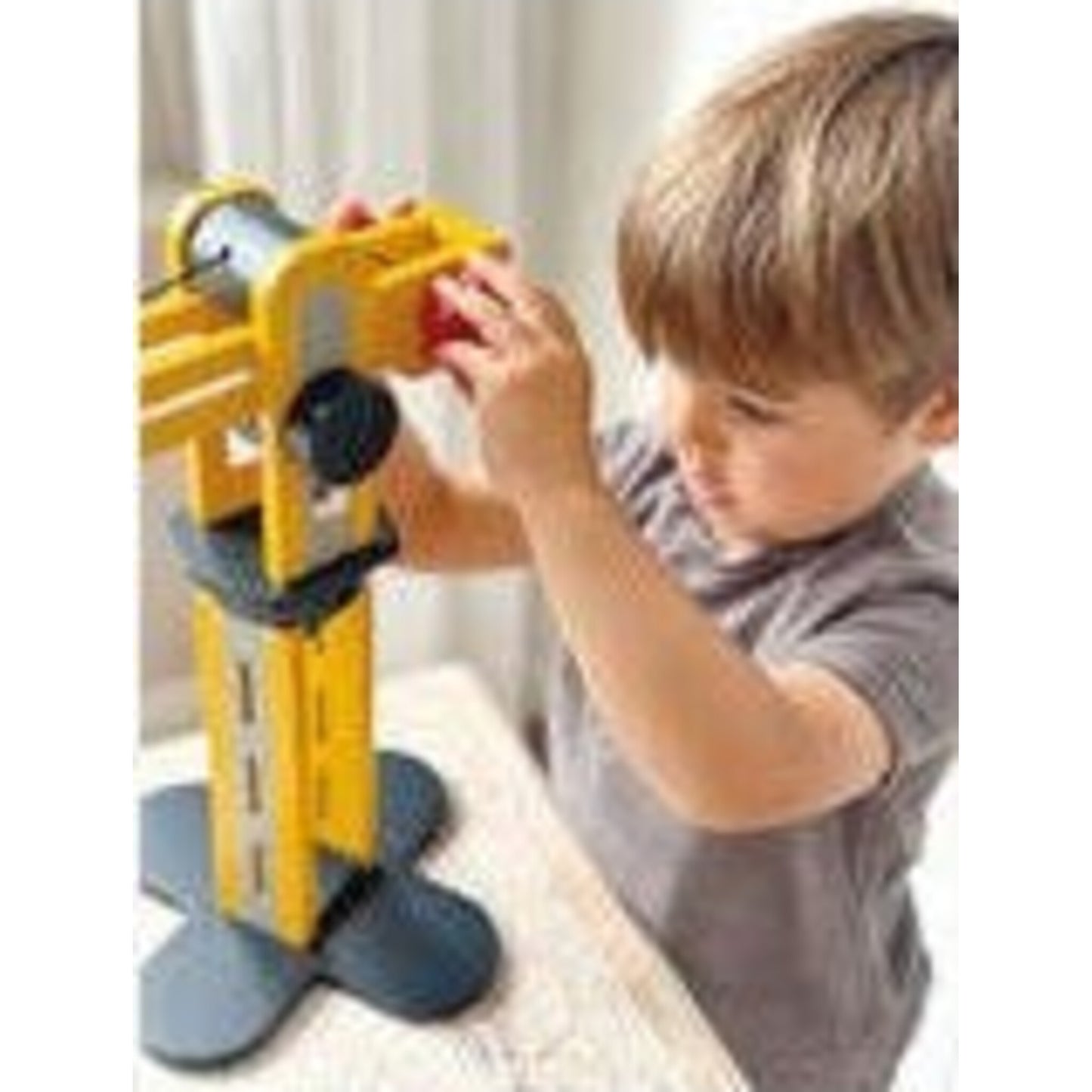 Big Yellow Crane – children's product by Mentari | Aster & Ruby