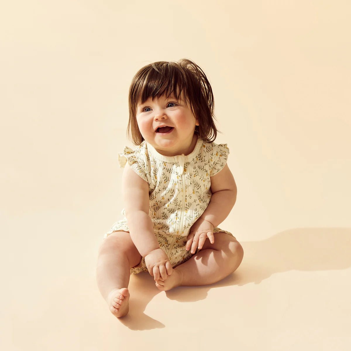 Lemon Leaf Organic Ruffle Zipsuit - Aster & Ruby