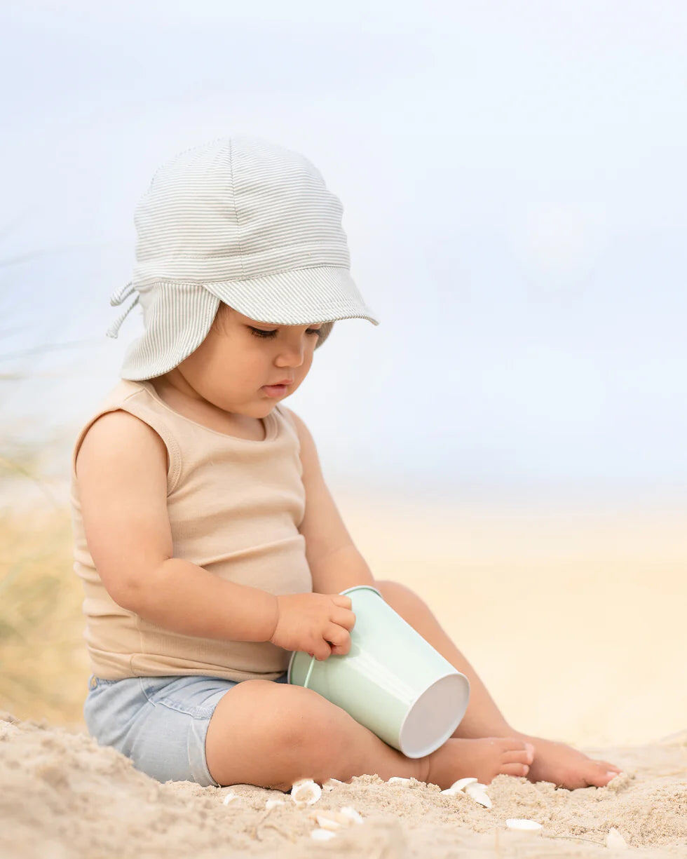 Toshi hat – Flap Cap Baby Sage from Aster & Ruby